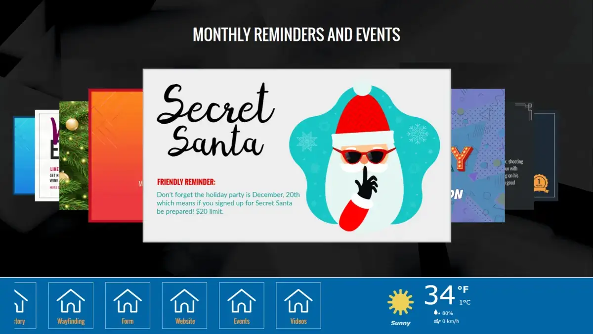 REACH Media Network digital signage touch screen displaying stock images for monthly reminders and events, Secret Santa friendly reminder image.